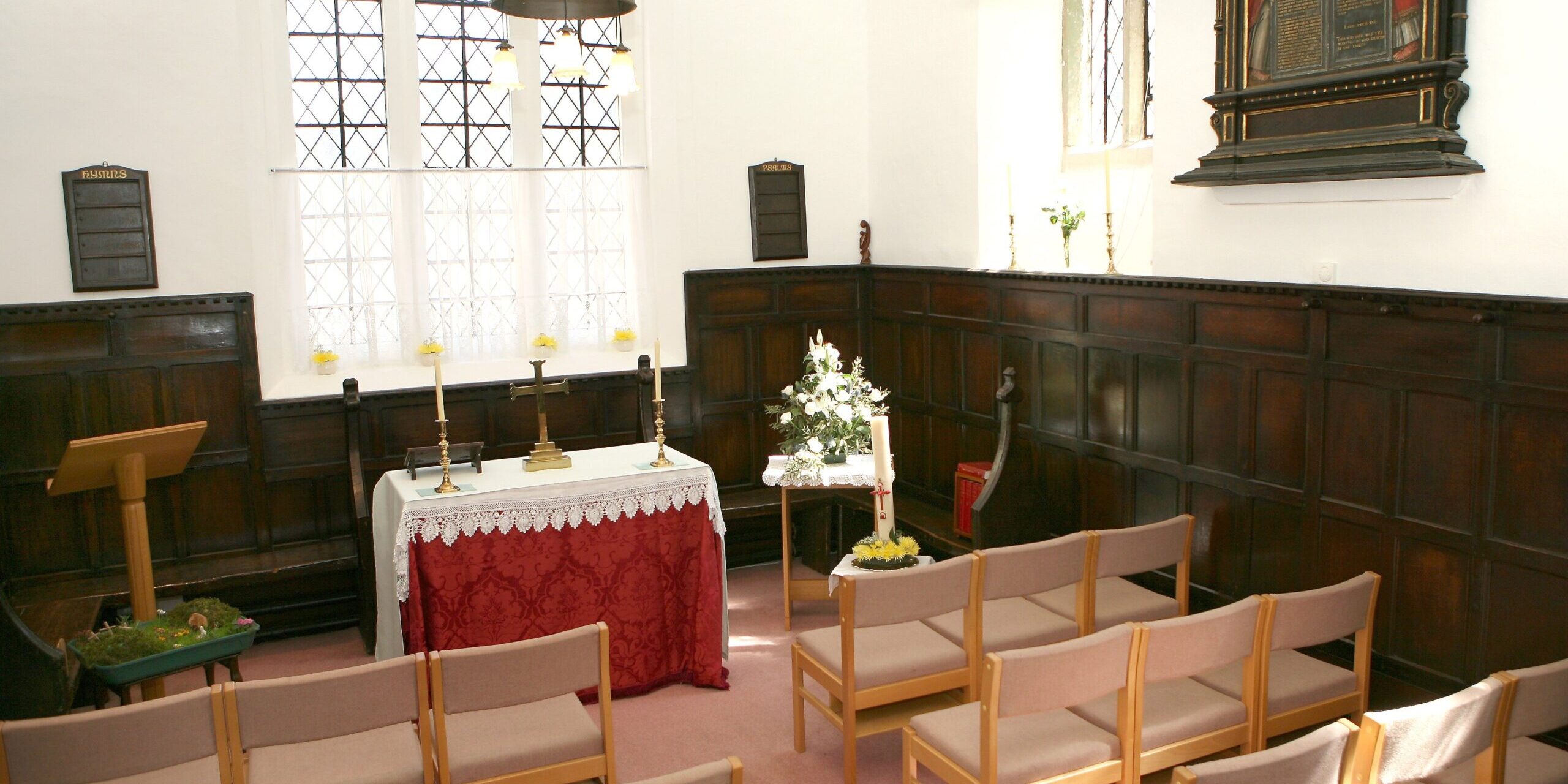 Whitgift Almshouses – Chapel Inside the chapel, modern seating is provided but the historic pews remain