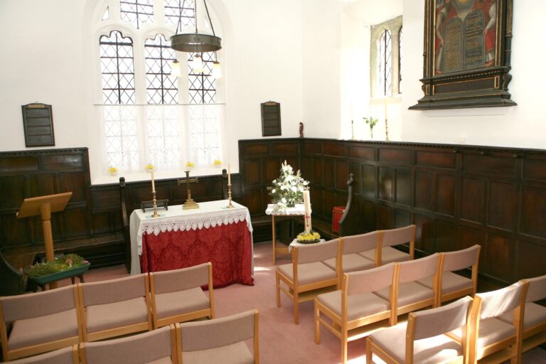 Inside the chapel, modern seating is provided but the historic pews remain
