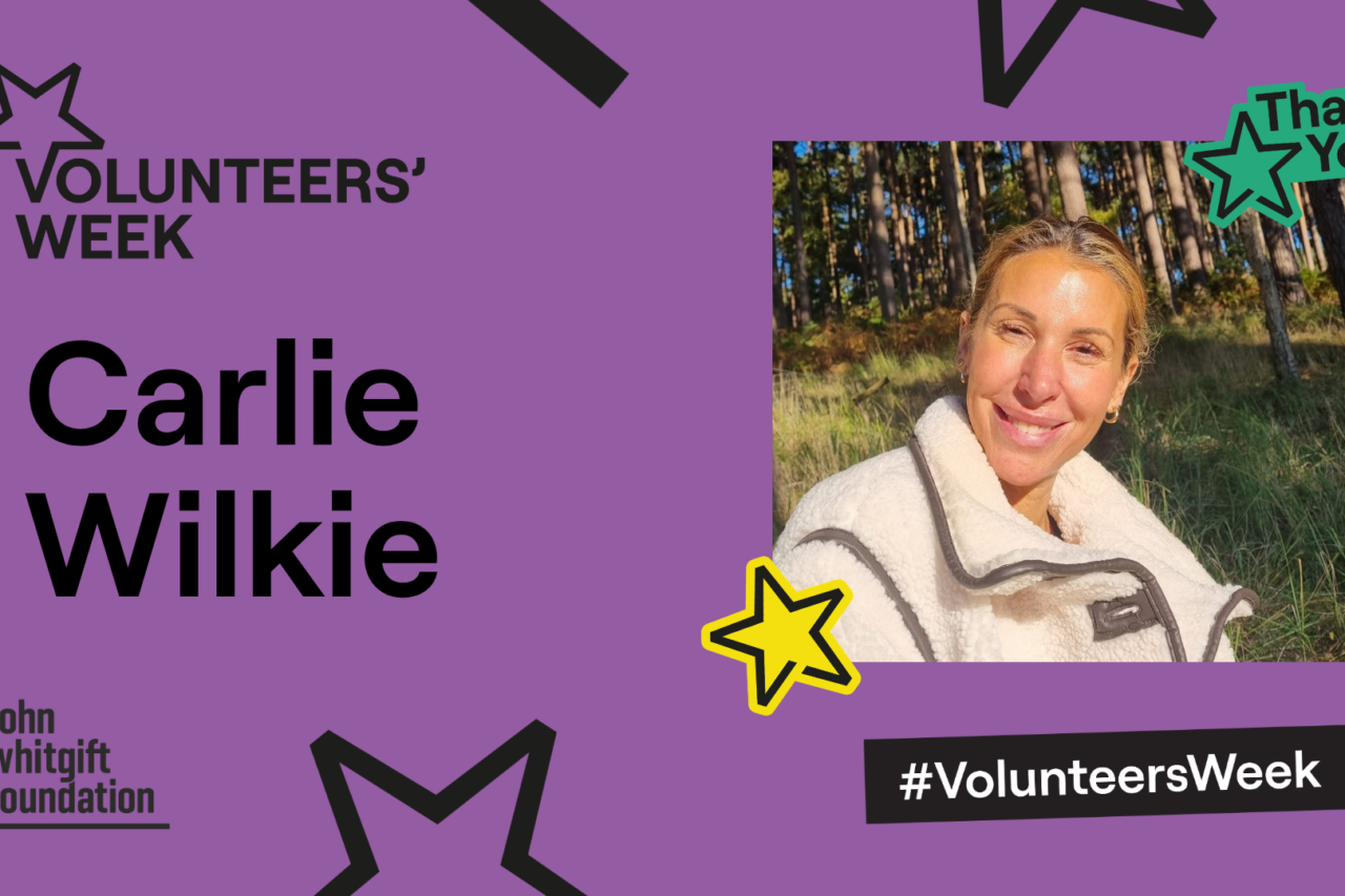 Carlie's photo appears on a purple backdrop, which also features the Volunteers' Week logo, several stars and a thank you message